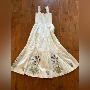 Cream size medium Tory Burch midi dress with handsewn details on the flowers.
